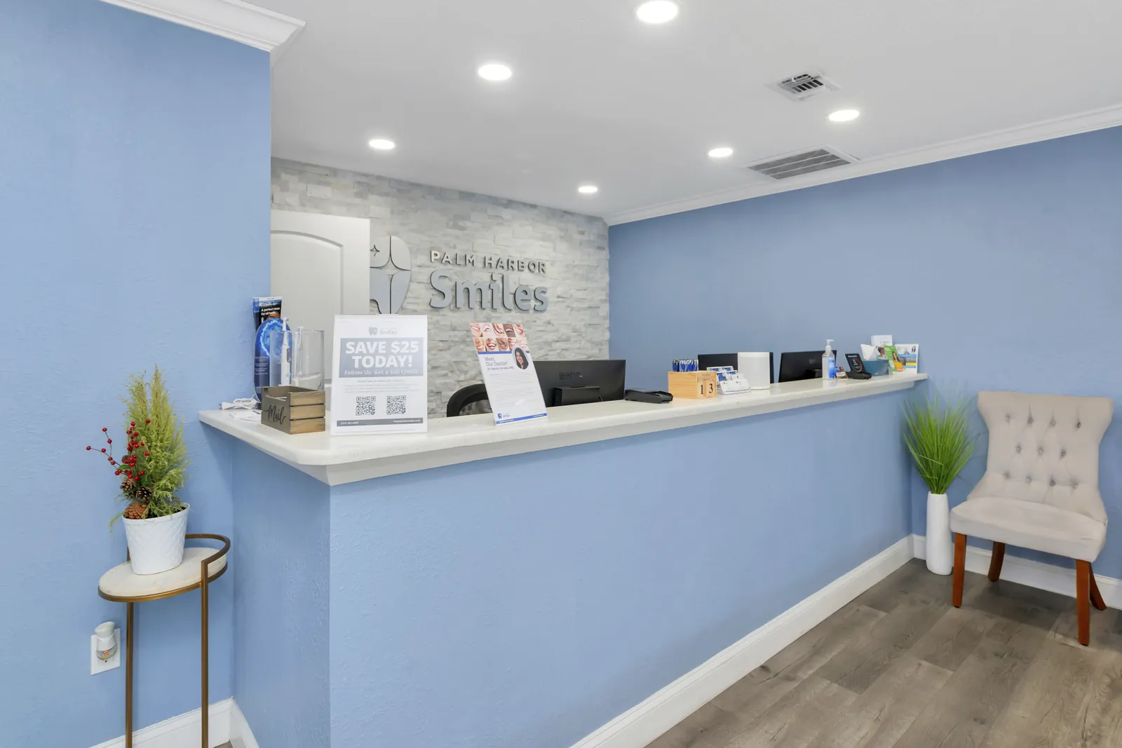 Dentist consulting with patient